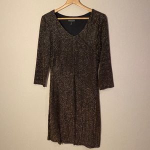 Glamour time. Nice gold and black sparkle dress